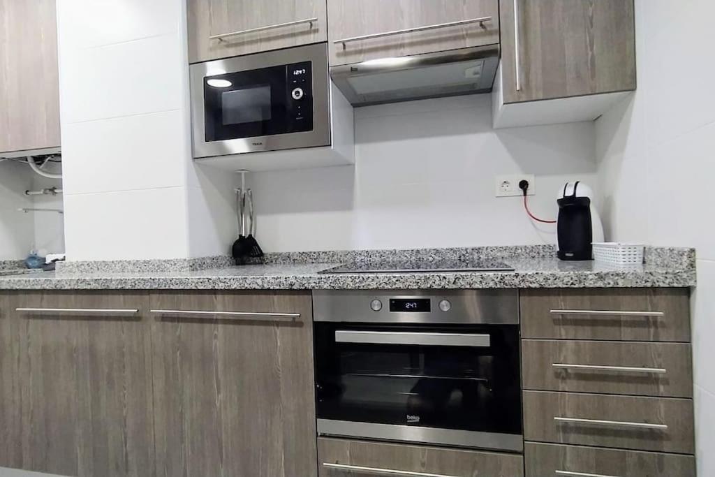 Ca Lolina Playa Apartment Gijon Bagian luar foto
