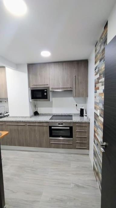 Ca Lolina Playa Apartment Gijon Bagian luar foto